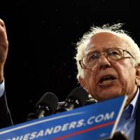 Democratic presidential candidate Bernie Sanders addresses a primary night election rally in Carson, California, on Wednesday. Sanders wins Oregon, battles Clinton in Kentucky