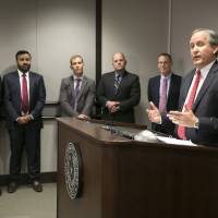 Republican Texas Attorney General Ken Paxton announces Texas' lawsuit to challenge President Obama's transgender bathroom order during a news conference in Austin, Texas, Wednesday. Texas and several other states are suing the Obama administration over its directive to U.S. public schools to let transgender students use the bathrooms and locker rooms that match their gender identity. Texas, 10 other conservative states sue over Obama's public school transgender directive