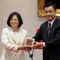 New Taiwanese President Tsai Ing-wen receives an official seal after her swearing-in ceremony held at the Presidential Office in Taipei on Friday. Under China's watchful gaze, Tsai sworn in as new Taiwan president