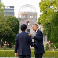 U.S. President Barack Obama and Prime Minister Shinzo Abe, after laying wreaths in front of a cenotaph as the atomic bomb dome is seen in the background at Hiroshima Peace Memorial Park on Friday. Full text of Obama's speech in Hiroshima