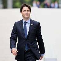 Canadian Prime Minister Justin Trudeau arrives at Ise Grand Shrine in Mie Prefecture on Thursday near the venue of the Group of Seven summit. Japanese swoon over Canada's 'hunky' Prime Minister Justin Trudeau