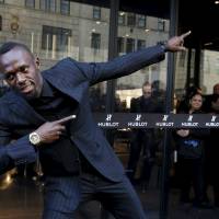 Sprinter Usain Bolt, seen posing during a ribbon-cutting ceremony to celebrate the opening of the flagship Hublot store on Fifth Avenue in New York City in April, begins his 2016 season at this weekend's Cayman Invitational. Jamaican superstar Bolt prepared for season debut