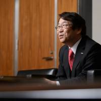 Kenji Sukeno, president of Fujifilm Holdings Corp., is interviewed in Tokyo on Thursday. Fujifilm is targeting 20 percent operating margins in its drug operations and aims to make the business profitable in the fiscal year starting April 2018, he said. Fujifilm's new chief aims to make drug operations profitable