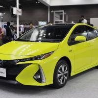 Toyota Motor Corp.'s new Prius PHV plug-in hybrid is shown to reporters on Wednesday in Tokyo. Toyota unveils plug-in Prius with world's first solar-panel option