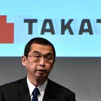 Takata Corp. President Shigehisa Takada is seen at a news conference in Tokyo on Nov. 4. On Tuesday, he said he will step down once he identifies a recovery path for the company. Takata chief says he'll quit after guiding air bag maker toward recovery