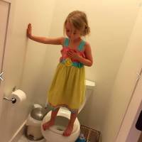 U.S. mom's picture of daughter, 3, practicing shooter lockdown drill goes viral