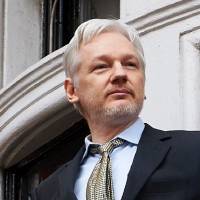 WikiLeaks founder Julian Assange on the balcony of the Ecuadorean Embassy in central London on Feb. 5, 2016. Angry WikiLeaks founder Assange starts fifth year cooped up in a London embassy