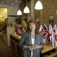 Dale Carr poses June 16 inside her shop Broken English at the district Kreuzberg in Berlin. Speaking ahead of the results, Sheffield native Dale Carr said that with a British exit, the only option she, her Scottish husband and her two British-passport holding children would have would be to apply for German citizenship. London minorities fear xenophobic onslaught as Brits bolt for Irish, other EU passports