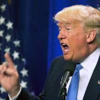 Republican presidential candidate Donald Trump speaks at Saint Anselm College Monday in Manchester, New Hampshire. Trump stumps fact-checkers with anti-terrorism speech, dumps press credentials for Washington Post