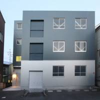 An 'itai hoteru,' or corpse hotel, stands in a residential and industrial area of Kawasaki. It is registered as a storage facility, but it allows mourners to stay the night. 'Corpse hotels' offer dignity for the dead as Japan's crematoriums struggle to keep up