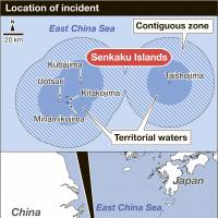 First Chinese warship to skirt Senkakus triggers protest from Tokyo