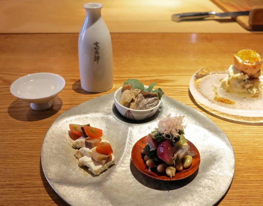 Kotaro Sake and nibbles: Meals at Kotaro in Shibuya open with an assorted appetizer plate, with an emphasis on organic seasonal vegetables. | ROBBIE SWINNERTON