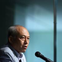 Life of luxury: Tokyo Gov. Yoichi Masuzoe speaks during a 2015 Tokyo seminar. After much denial, Masuzoe recently admitted that his use of public funds for private extravagances was perhaps excessive. In Japan, all that is true melts into hot air