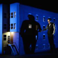 Back story: Robert Lepage performs in his solo work 887 beside a transformer model of the Quebec City apartment block in which he grew up. Lepage's '887' addresses memories in magical ways