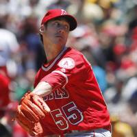 Los Angeles' Tim Lincecum delivers during the Angels' 7-1 win over the A's on Saturday. Lincecum wins in return to majors