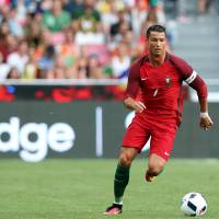 Portugal's Cristiano Ronaldo controls the ball against Estonia on Wednesday in Lisbon. Portugal won the friendly 7-0. Ronaldo ignites Portugal in rout of Estonia