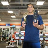 Sprinter Aska Cambridge poses for a photo at Dome Athlete House in Tokyo on Thursday. Cambridge dreaming of big future