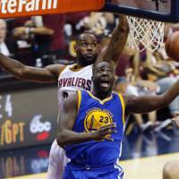 Golden State will have Draymond Green (front) back for Game 6 of the NBA Finals against Cleveland on Thursday after the star was suspended for Game 5. The Warriors lead the series 3-2. Warriors confident of winning second title