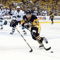 Pittsburgh's Conor Sheary (43) controls the puck as San Jose's Justin Braun defends during the Penguins' 2-1 win in Game 2 of the Stanley Cup Final on Wednesday. Penguins edge Sharks in overtime, take 2-0 series lead