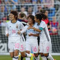 Japan’s Mana Iwabuchi (center) Yuki Ogimi (right) and Mizuho Sakaguchi react after Iwabuchi’s first-half goal against the United States on Thursday in Commerce City, Colorado. Nadeshiko Japan earns draw against U.S. in Takakura's debut