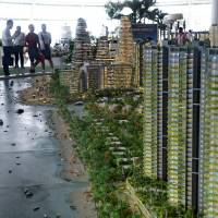 A scale model of development at Forest City on one of the man-made islands on the Malaysian side of the Straits of Johor is displayed at the site on April 19. Reclaimed city off Singapore triggers ecology fears