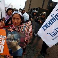 Peruvians rally for the release of former President Alberto Fujimori in Lima on Friday. Peru's Ailing former President Fujimori seeks pardon