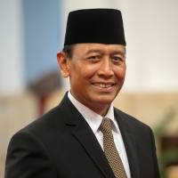 Indonesian Chief Security Minister Wiranto poses during the announcement of the new Cabinet at the Presidential Palace in Jakarta on Wednesday. Indonesia names controversial ex-general as security chief