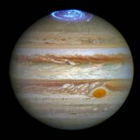 This image released by NASA on Thursday shows auroras in Jupiter's atmosphere. NASA orbiter Juno poised to rendezvous with Jupiter, peek through its clouds