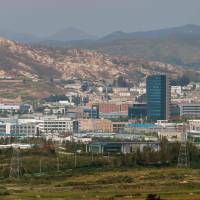 The Kaesong joint industrial park is seen from an observation post in Paju, on the border between the two Koreas, in September 2013. Factory owners at inter-Korean Kaesong experiment waging campaign to have industrial park reopened