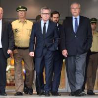 German Interior Minister Thomas de Maiziere (second from right) and Bavaria's Interior Minister Joachim Herrmann (right) walk in front of the Olympia Einkaufszentrum shopping mall in Munich on Saturday, a day after a teenager went on a shooting spree, killing nine people and wounding 16 before turning the gun on himself. The gunman, a German-Iranian named David Ali Sonboly, suffered depression and was obsessed with shooting sprees like the 2011 massacre by Norwegian right-wing fanatic Anders Behring Breivik. Munich gunman was fixated on mass killing, had no Islamist ties