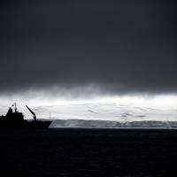 Chilean Navy ship the Aquiles moves alongside the Hurd Peninsula, seen from Livingston Islands, part of the South Shetland Islands archipelago in Antarctica, in January 2015. Antarctica's ozone hole is finally starting to heal, a new study finds. CFC ban praised as ozone hole over Antarctic starting to 'heal'