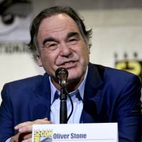 Director-writer Oliver Stone attends the “Snowden” panel on day 1 of Comic-Con International on Thursday in San Diego. Oliver Stone, plugging new flick 'Snowden,' warns of 'Pokemon Go' totalitarianism