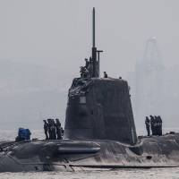 The nuclear submarine HMS Ambush makes an unscheduled stop in Gibraltar Wednesday due to sustained damage to its conning tower after hitting a vessel. U.K. says reactor safe as dented British sub docks at 'the Rock' after colliding with freighter