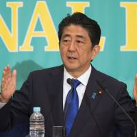 Measuring success: Shinzo Abe, Japan's prime minister and president of the Liberal Democratic Party, gestures as he speaks during a debate with other party leaders ahead of the Upper House election. Abe is calling on voters to keep the faith with Abenomics, despite widespread consensus that it has been a dismal flop and has failed to revive the Japanese economy or improve household welfare What are Shinzo Abe's real three arrows?