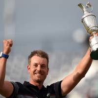Henrik Stenson lifts the Claret Jug after winning the British Open on Sunday in Troon, Scotland. Stenson wins duel with Mickelson to claim British Open