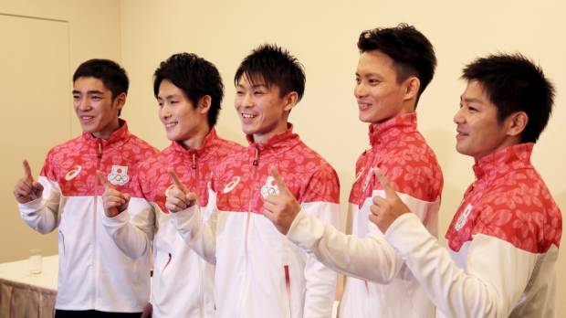(From left) Japanese gymnasts Kenzo Shirai, Ryohei Kato, Kohei Uchimura, Yusuke Tanaka and Koji Yamamuro pose for a photo at a Tokyo news conference on Tuesday. Japan men's gymnastics squad relaxed, focused before long journey to Rio