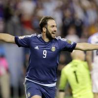 Gonzalo Higuain celebrates after scoring for Argentina against the United States in the semifinals of the Copa America in Houston last month. Higuain completes Juventus move