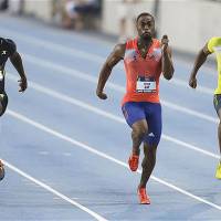 Tyson Gay (center) has made the U.S. 4x100-meter relay team for the Rio Olympics after returning from a one-year doping ban. Gay gets chance to recapture relay medal
