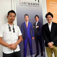 Takahiko Morinaga (left), CEO of Japan LGBT Research Institute, a think tank run by advertising giant Hakuhodo DY Holdings, and Hidenori Tomatsu, the think tank’s chief operating officer, pose for a photo at their office in Minato Ward, Tokyo, on Aug. 9. New think tank in Japan offers tips on LGBT awareness, market potential