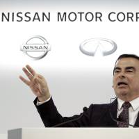 Carlos Ghosn, chief executive officer of Nissan Motor Co., gestures as he speaks during a news conference in Yokohama on May 12. In Olympic campaign, Nissan bets on a Brazilian recovery