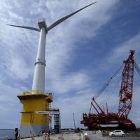A 7-megawatt turbine for a pilot project led by Marubeni Corp. and funded by the government stands at a port in Onahama, Fukushima Prefecture, in June 2015. Fukushima floating wind farm is Japan's entry into contested sector