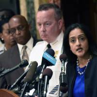 Principal Deputy Assistant Attorney General Vanita Gupta speaks during a news conference as Police Commissioner Kevin Davis and City Council President Bernard C. Jack Young listen at City Hall in response to a Justice Department report Wednesday in Baltimore. Baltimore vows vast police reforms after report blasts rights abuses of blacks