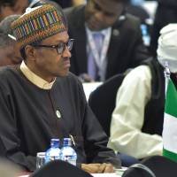 Nigerian President Muhammadu Buhari takes part in a high-level meeting during the the TICAD (Tokyo International Conference on African Development) conference Sunday in Nairobi. Boko Haram leader wounded, group no longer holds territory, Nigeria president says on TICAD sidelines