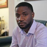 Dominique Alexander poses for a photo Thursday at his apartment in Dallas. Alexander, a leader of the protest where a sniper killed multiple law enforcement officers in Dallas, was ordered to prison Friday for unrelated probation violations. Dallas cops snub critics, questions about sniper attack, jail protest leader