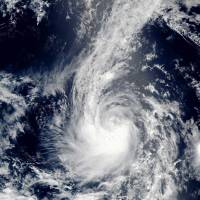This NASA satellite image, released Saturday, shows Tropical Storm Madeline in the eastern Pacific Ocean. Madeline picked up speed as it headed toward the Hawaii islands on Sunday, and it is expected to strengthen and become a hurricane by Monday. Tropical Storm Madeline targets Hawaii as Hurricane Lester heads west away from Mexico