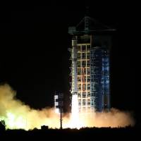 A Long March-2D rocket carrying the world's first quantum satellite lifts off from the Jiuquan Satellite Launch Center in Jiuquan, northwestern China, early Tuesday. China satellite to test ‘unhackable’ data links