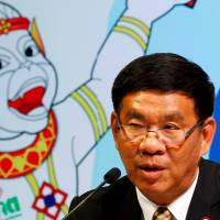 Thai Election Commissioner Somchai Srisutthiyakorn speaks during a news conference Monday on the result of the nation's constitutional referendum. Thai junta poll win sends country 'backward': Yingluck