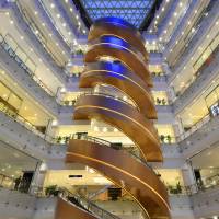 A spiral escalator installed in a Shanghai department store by Mitsubishi Electric Corp. is shown in this handout image. Special Mitsubishi Electric plant focuses on custom lifts for Asian venues