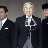 Emperor Akihito, flanked by Crown Prince Naruhito and Crown Princess Masako, appears in a bulletproof balcony at the Imperial Palace in Tokyo for a public appearance on Dec. 23, 2007. Around 87% of Japanese would support Emperor's abdication