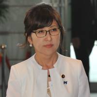 Tomomi Inada, who was appointed defense minister, enters the Prime Minister's Office on Wednesday. Abe's defense minister pick sparks concern over relations with South Korea